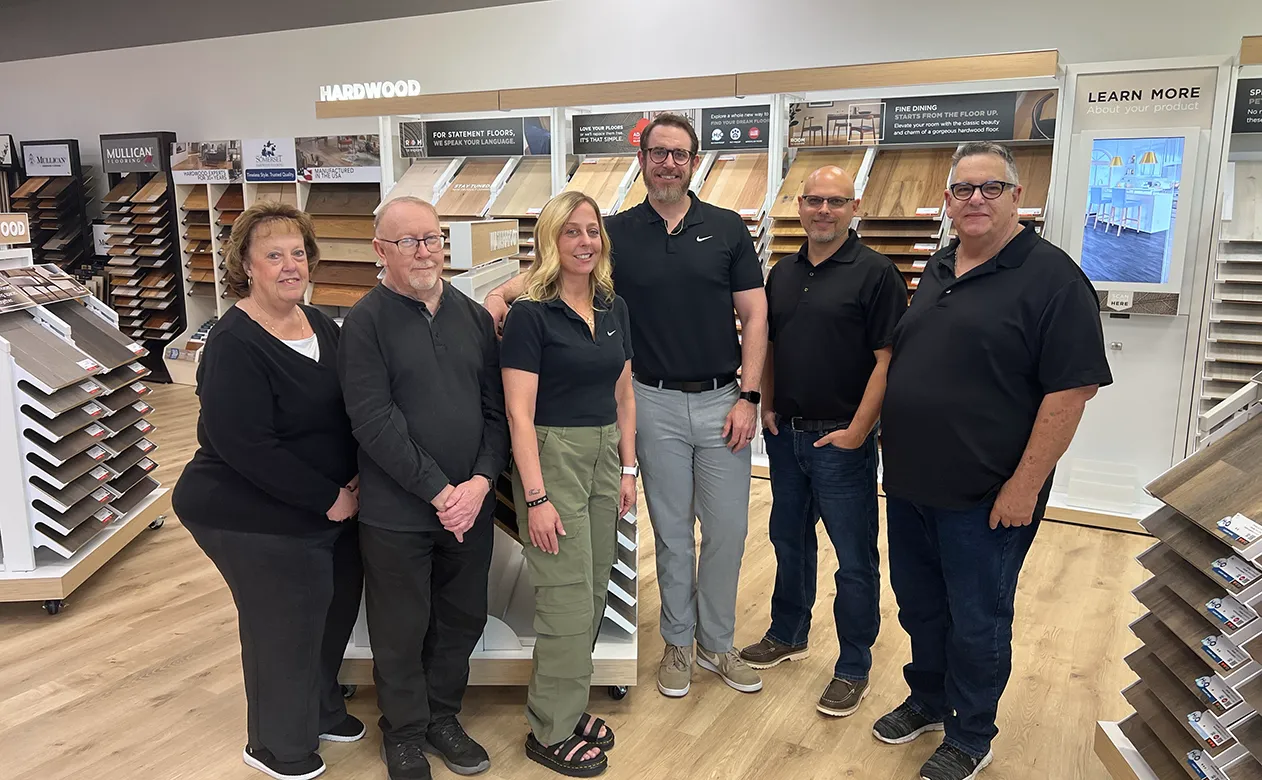 Buddy's Flooring America Team in front of Retail 2.0 Displays