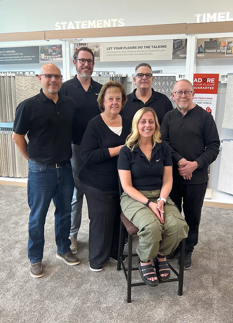 Buddy's Flooring America Team in front of Retail 2.0 Displays