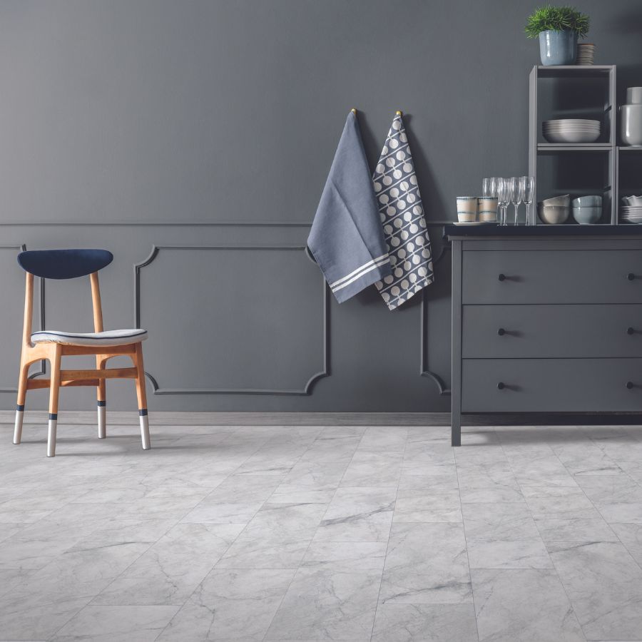 LVT floors in a grey and blue themed kitchen